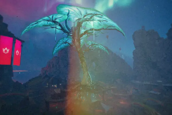 A huge glowing blue tree on a rocky hilltop in an Apex Legends map, with red banners hanging nearby.