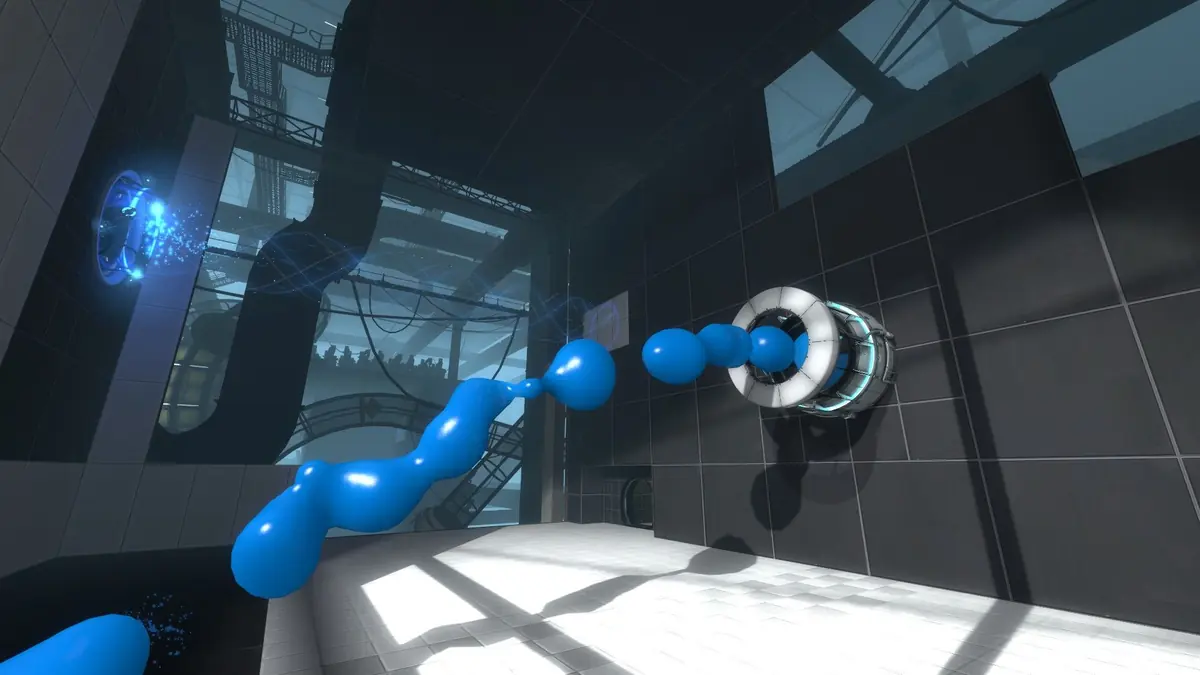 A Portal 2 test chamber where a stream of blue gel pours through a portal.