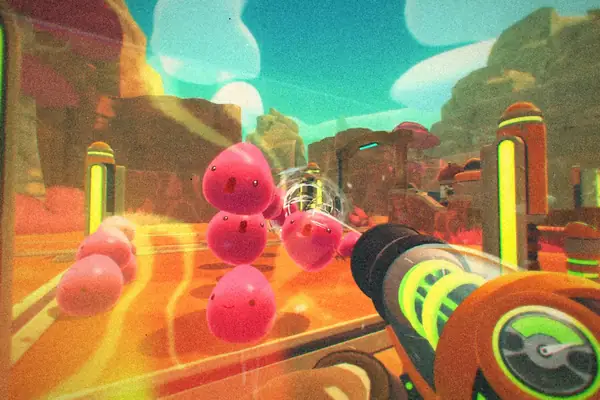 A vacpack pointed at bouncing pink slimes on a sunny ranch in Slime Rancher.